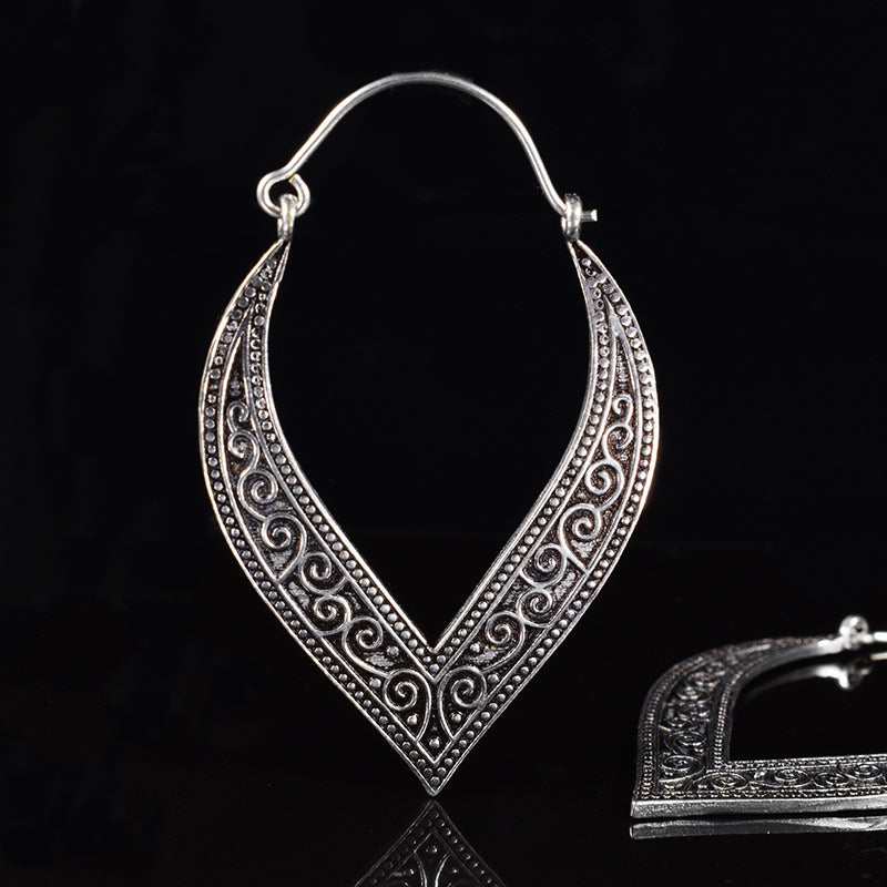 Indian earrings in silver brass in a petal design