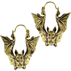 a pair of bat earrings in brass for all the goths