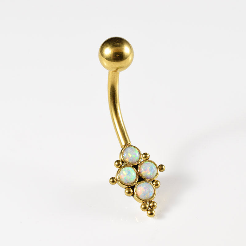 navel bar in gold steel with cluster of opal stones and tribal dots