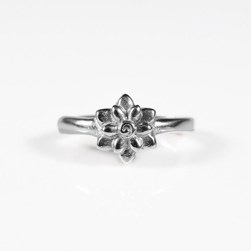 rook clicker ring with lotus flower