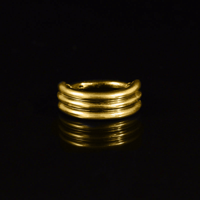 gold piercing clicker ring with triple bars