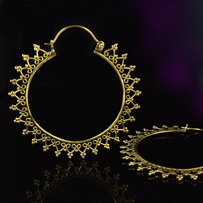 Large Hoop Earrings in Golden Brass featuring an Indian heart mandala design