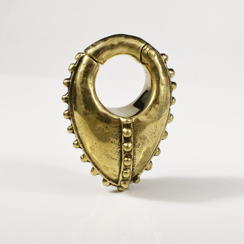 tribal ear weights in gold brass