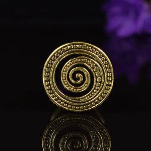 spiral ear tunnels in brass