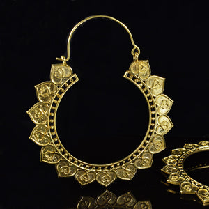 Large Indian hoop earrings with a heart mandala design