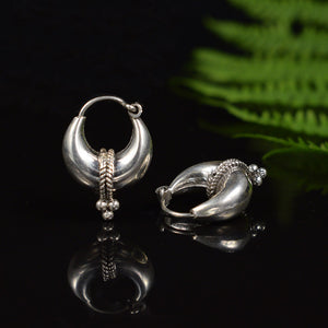 small tribal Indian hoop earrings featuring traditional rope motif and pyramid of dots 