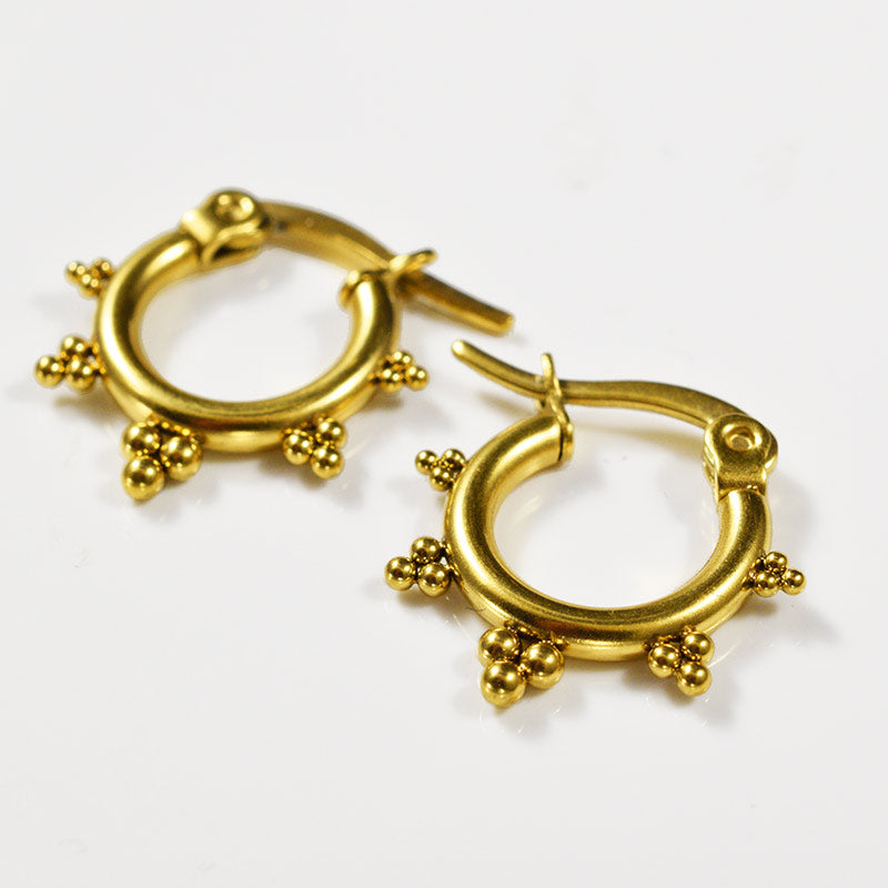 tribal earrings in gold steel