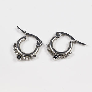 surgical steel tribal style earrings with dots and black ony stones
