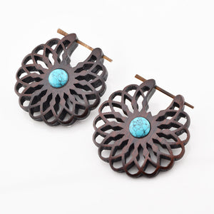 wooden stick pin earrings in a flower design with turquoise stones