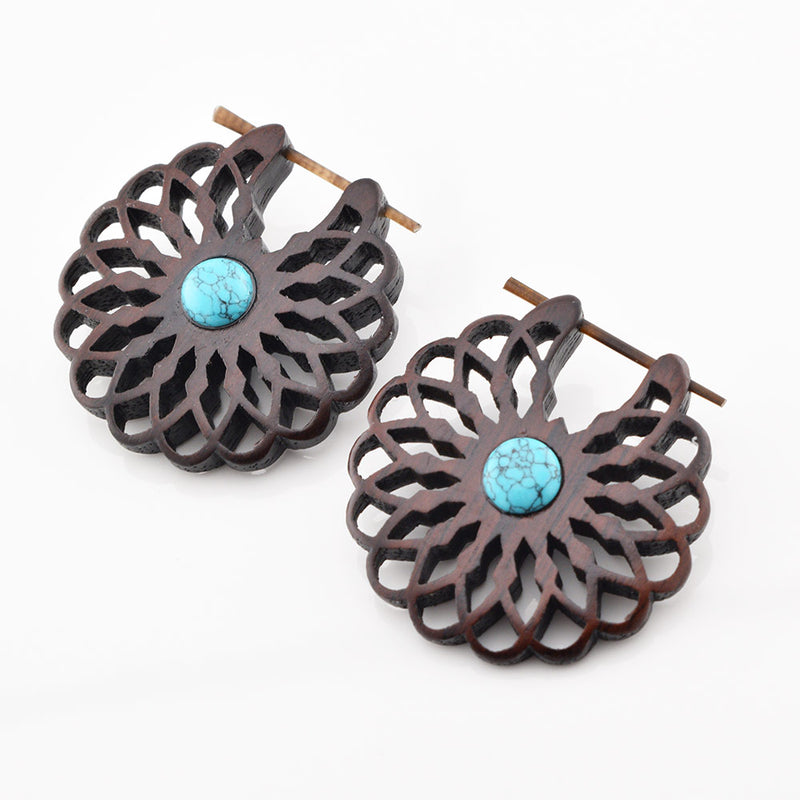 wooden stick pin earrings in a flower design with turquoise stones