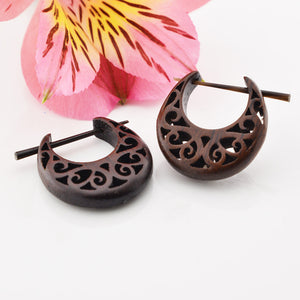 wooden stick or pin earrings. Ornate spiral design 