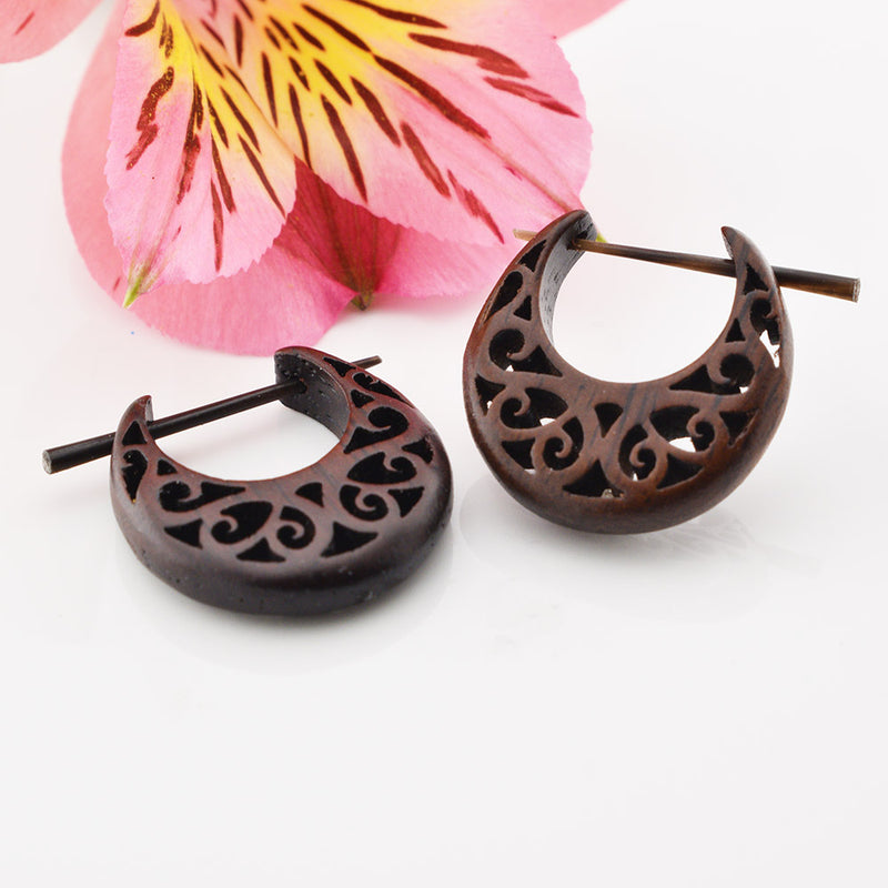 wooden stick or pin earrings. Ornate spiral design 
