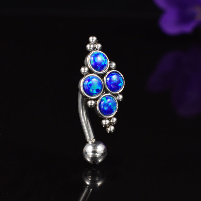 reverse navel bar with deep blue opal cluster and decorative beading