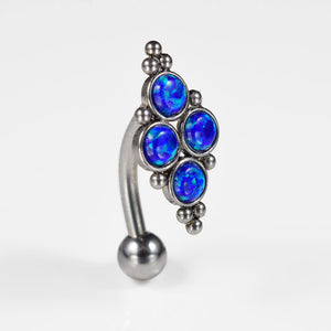 1.6mm reverse belly bar with deep blue opal stones and decorative beading