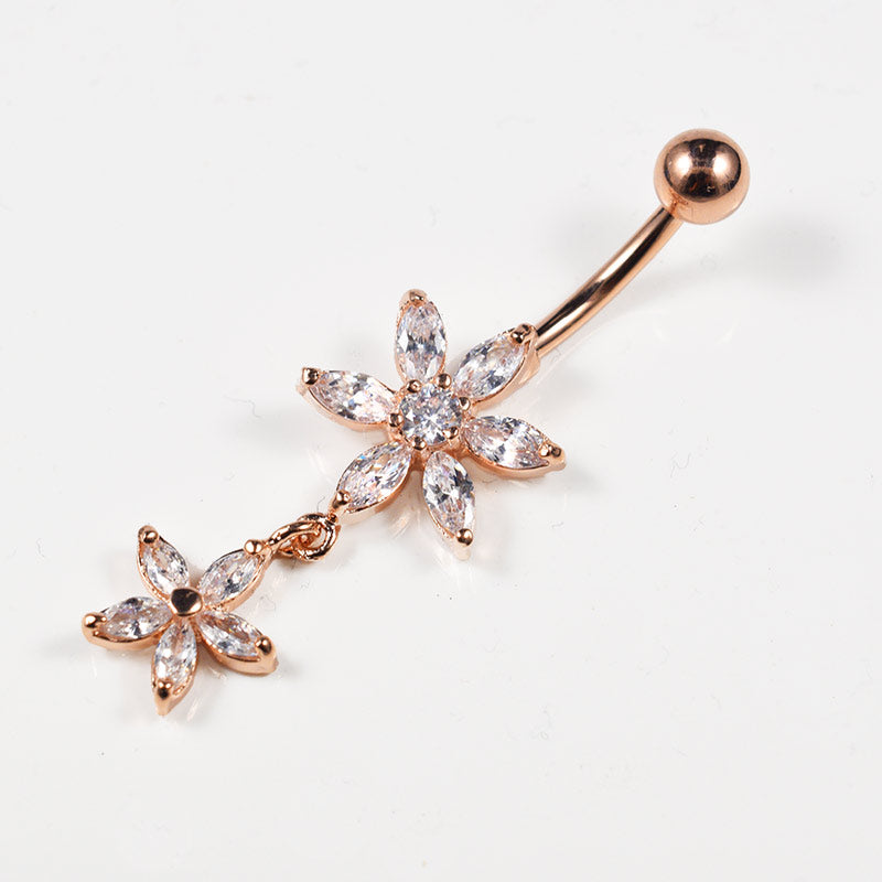 rose gold belly bar with clear crystal flower and dangling crystal flower