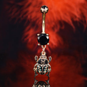 rose gold navel bar with black gems andscarab charm