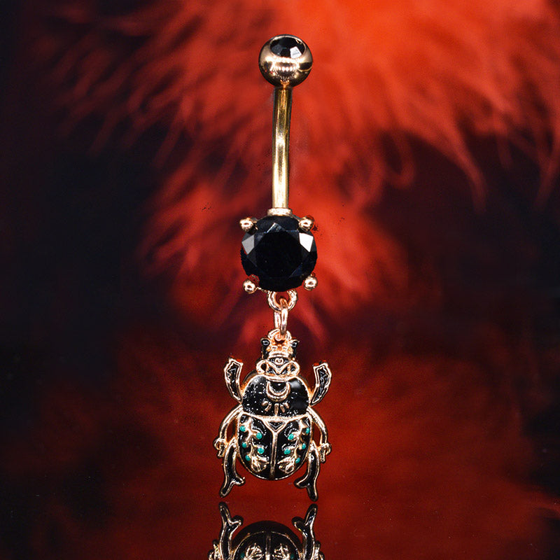 rose gold navel bar with black gems andscarab charm