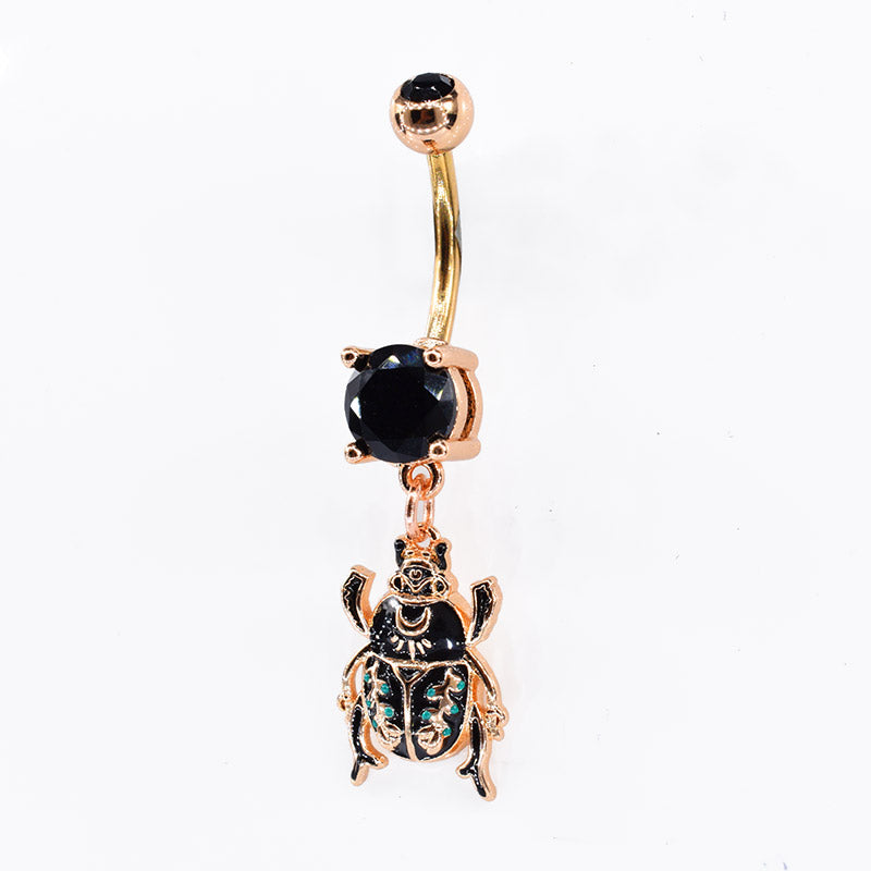 rose gold belly bar with black gems and scarab beetle