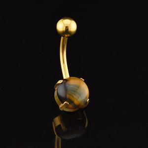 Gold steel navel bar with prong set tigers eye stone