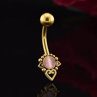 gold steel navel bar with pink rose cats eye stone and tribal beads and hearts