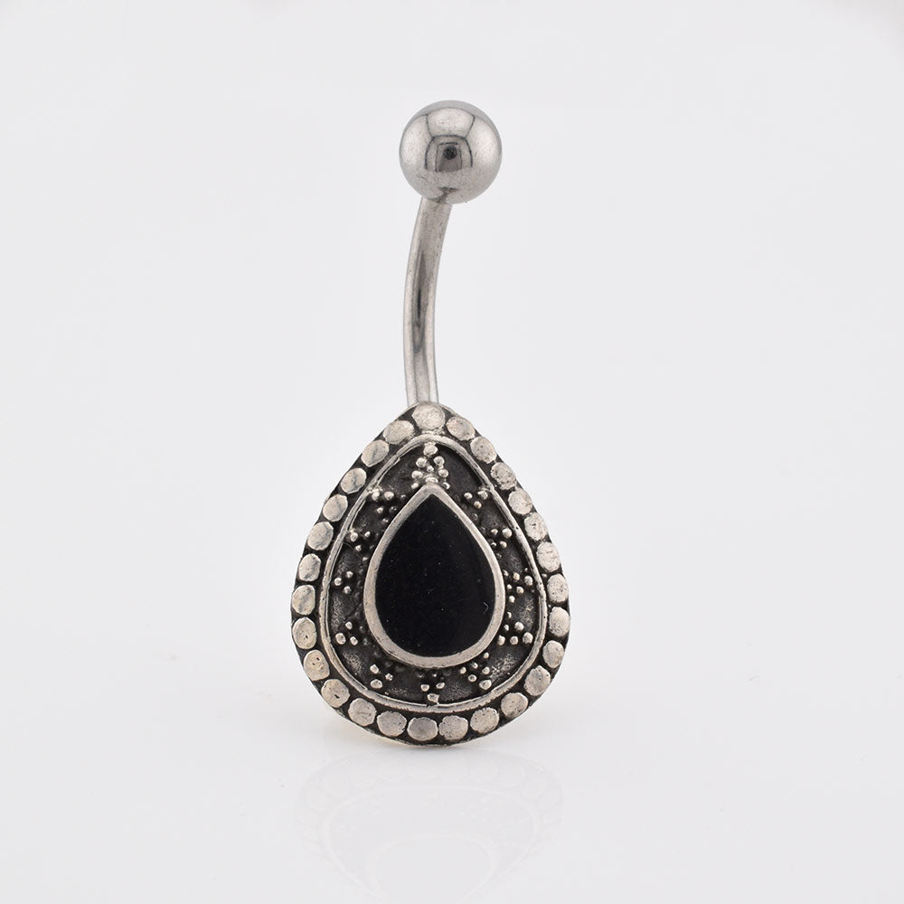 A sterling silver ended navel bar / belly button  ring with a teardrop-shaped shield featuring a black Onyx teardrop center and a border of small silver dots, shown on a plain white background.