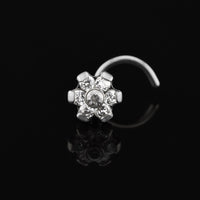 titanium nose stud with prong set crystals in a flower design