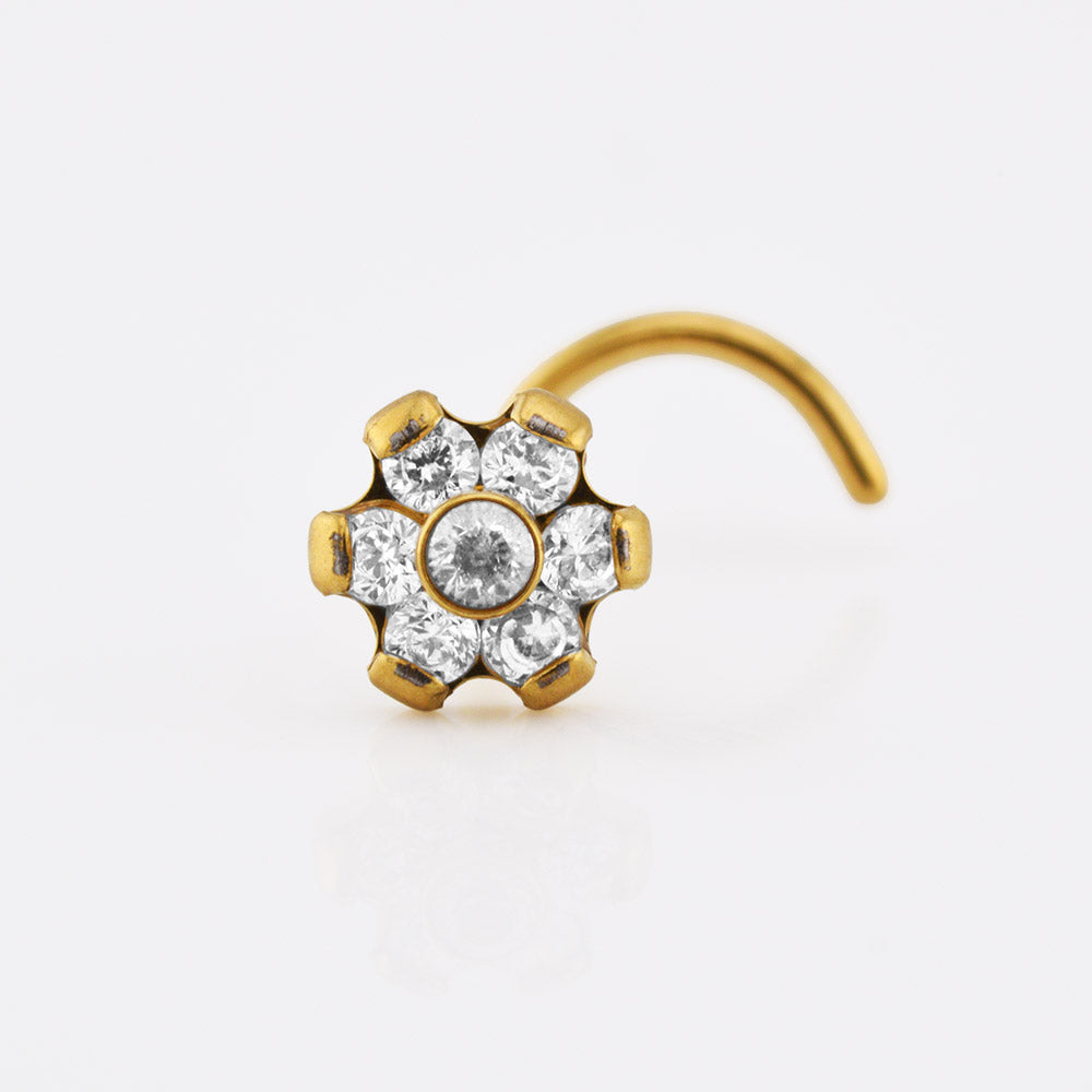 gold titanium nose stud with 7 clear crystals set in a flower design