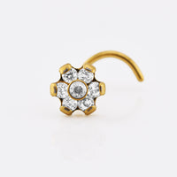 gold titanium nose stud with 7 clear crystals set in a flower design
