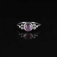 Indian style nose ring with amethyst stone and tribal dot design