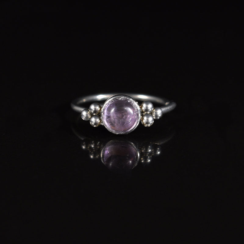 Indian style nose ring with amethyst stone and tribal dot design