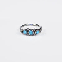 tribal style nose ring with blue turquoise stones and dots