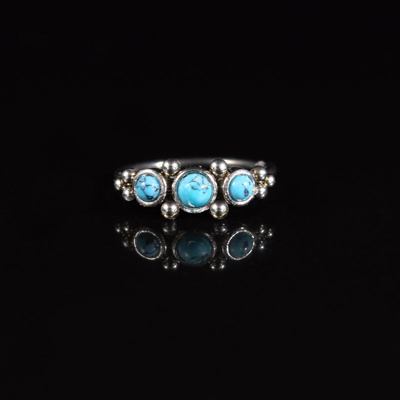 tribal style nose ring with blue turquoise stones