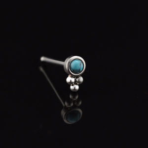 tribal style nose stud with turquoise stone and triple dots