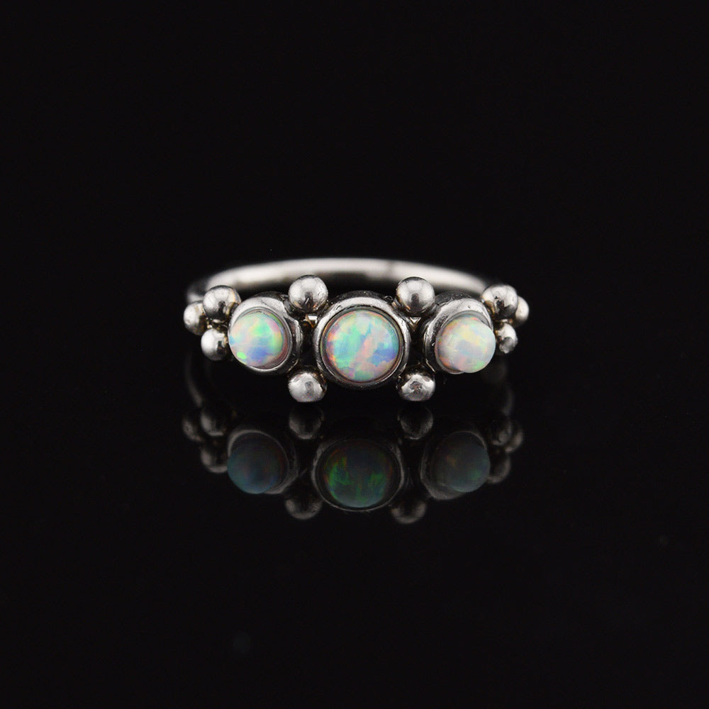 indian style nose ring with opal stones and tribal dots