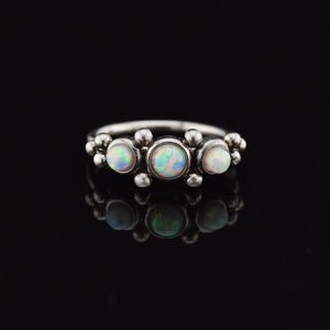 indian style nose ring with opal stones and tribal dots