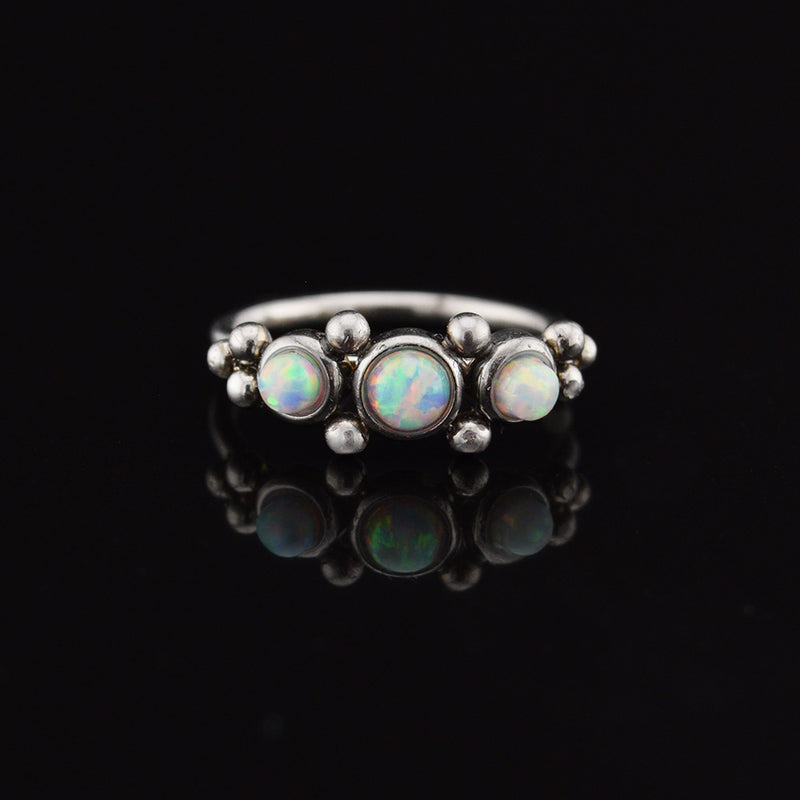 indian style nose ring with opal stones and tribal dots