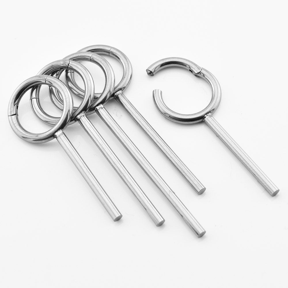 Five silver metal ear piercing clicker rings with straight posts and circular hoop ends, displayed on a clean white background.