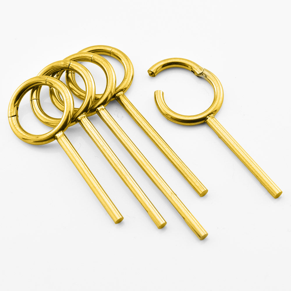 Five gold-colored metal ear piercings with circular hoop tops and straight barbell posts, arranged on a clean white background.