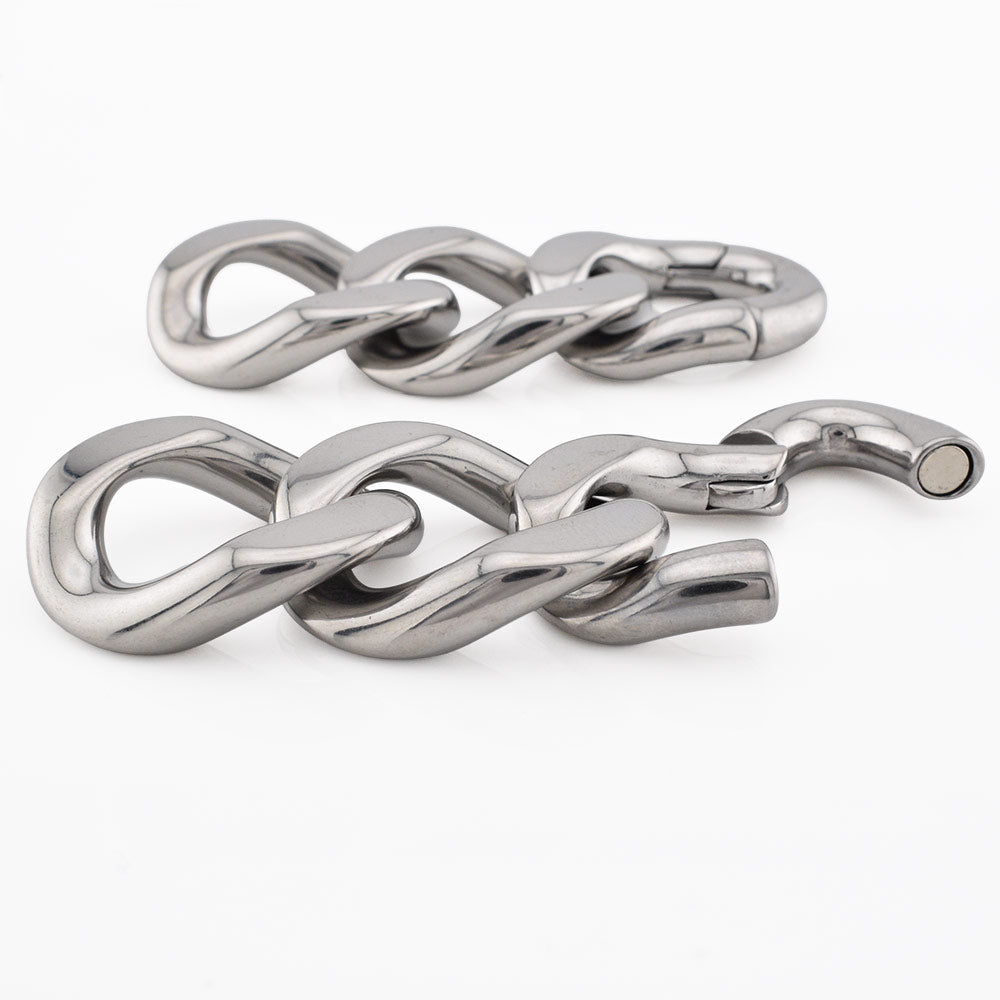 Polished silver-toned metal chain link ear weights with thick, glossy interlocking links and a magnetic clasp, photographed on a clean white background.