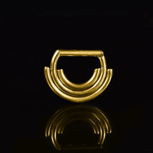 very small and snug septum clicker in gold steel with triple ring bars