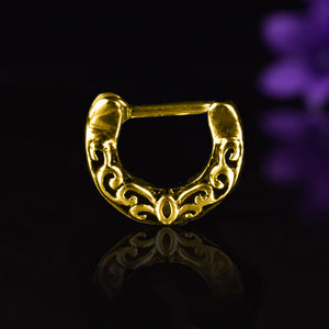 gold septum clicker with filigree design