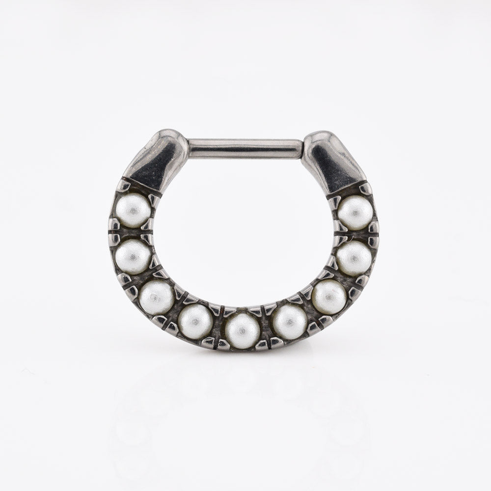 septum clicker ring with pearls on a  white background