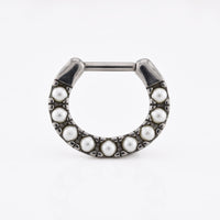 septum clicker ring with pearls on a  white background