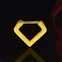 V shape septum ring in gold steel on a black reflective background