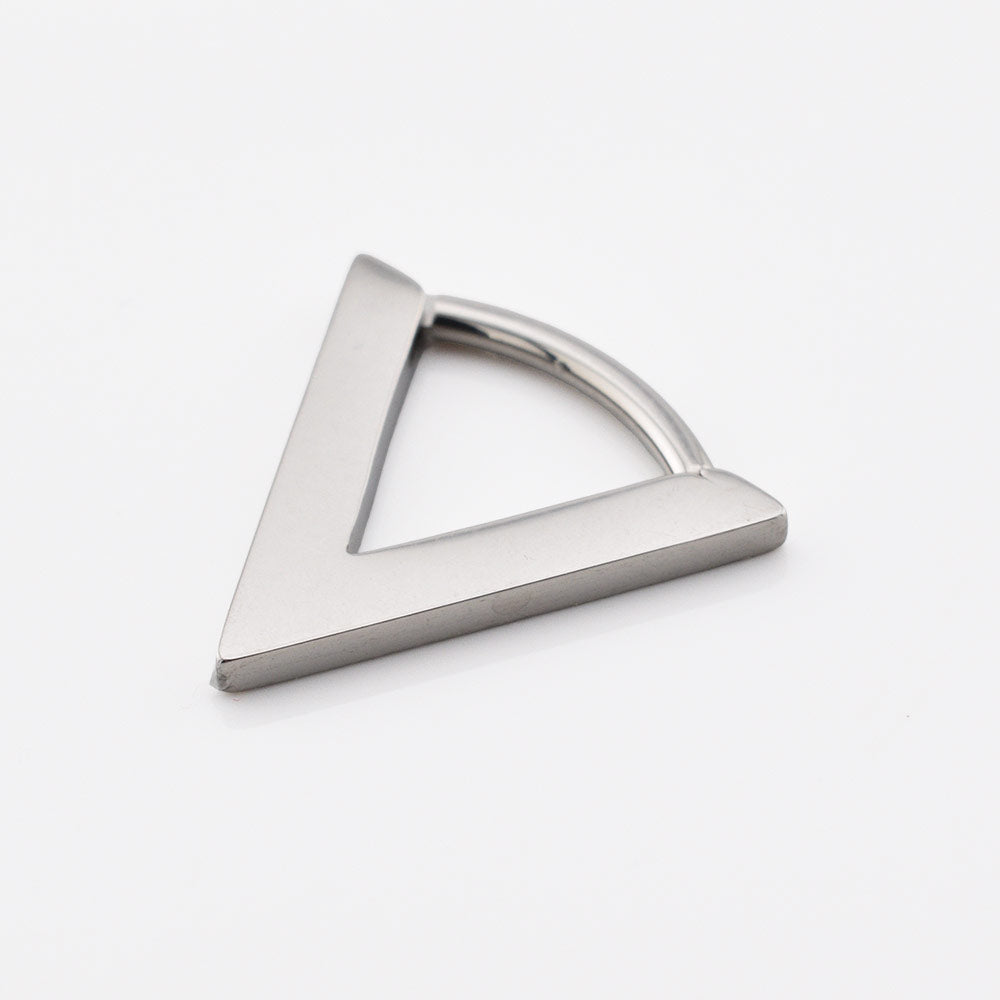 V shape septum clicker ring in surgical steel on a white background