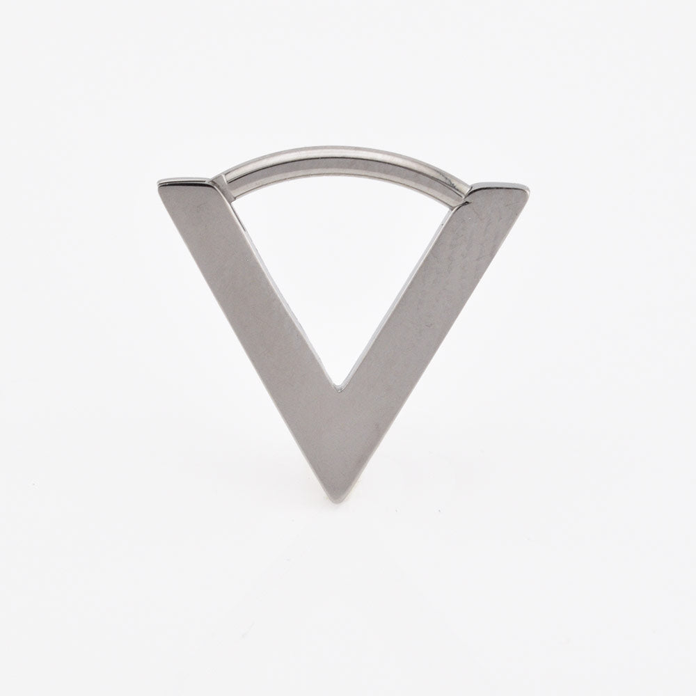 V shape septum clicker in surgical steel on a plain white background