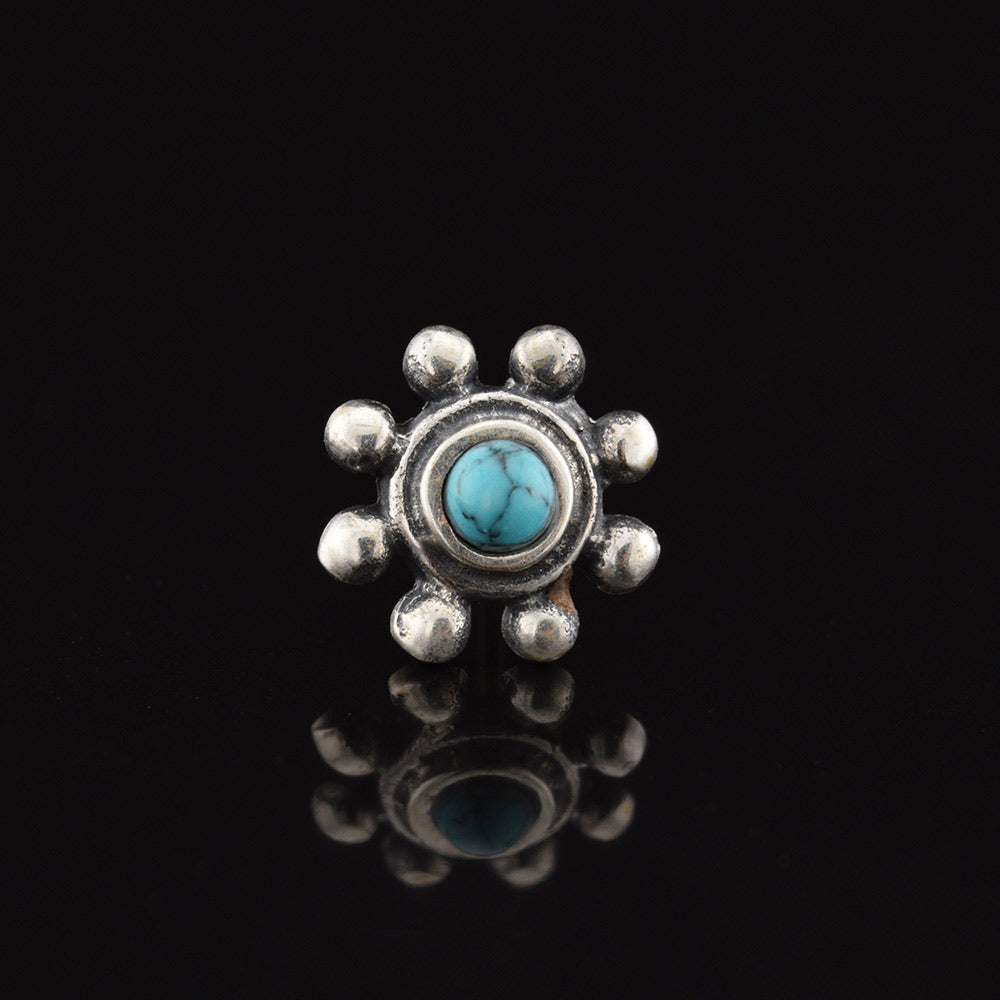silver threadless end, tribal dots surrounding turquoise stone