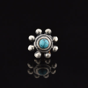 silver threadless end, tribal dots surrounding turquoise stone