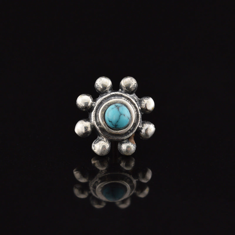 silver threadless end, tribal dots surrounding turquoise stone
