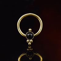 gold bcr with black onyx stone and tribal dots 6mm and 8mm diameter